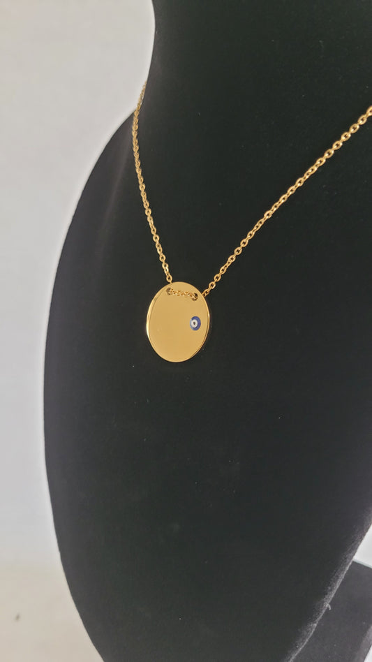 Ojo en Dije Redondo Dorado